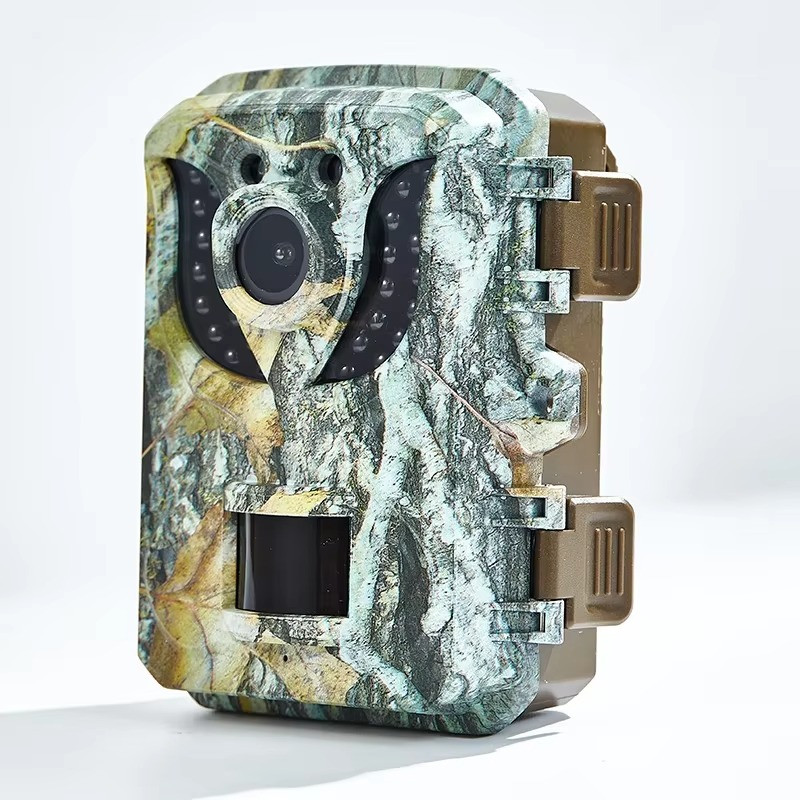Mini caméra de chasse HD tenue dans la paume de la main